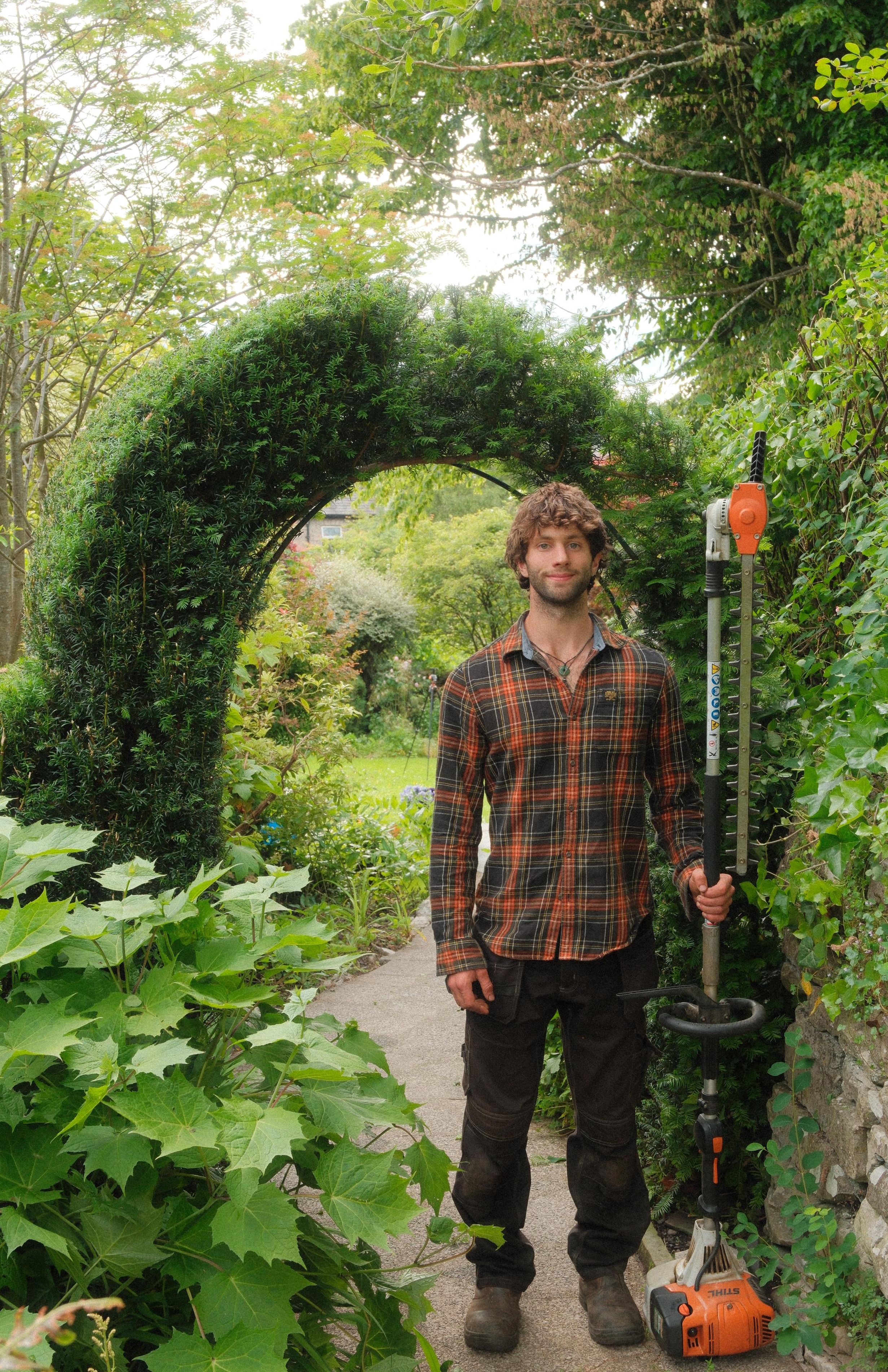 Ollie with a hedge cutter